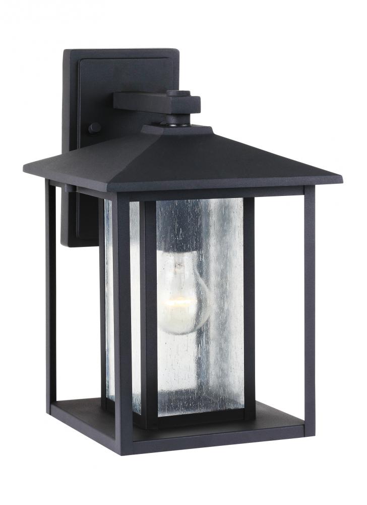 Hunnington contemporary 1-light outdoor exterior medium wall lantern in black finish with clear seed
